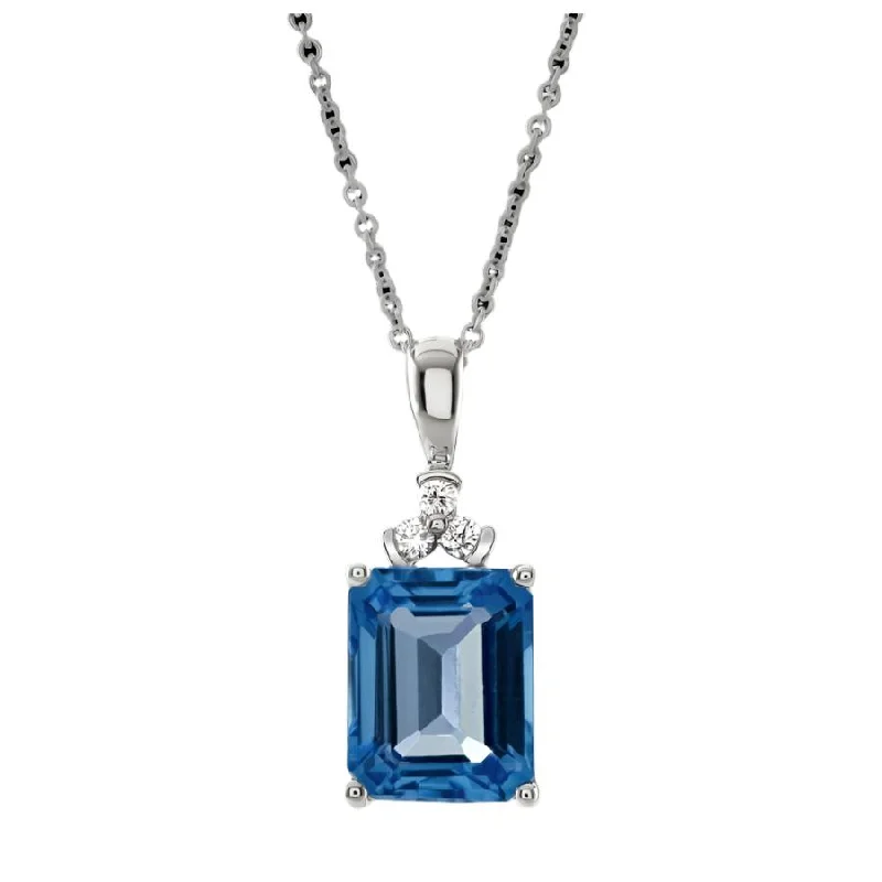 Astro theme engagement rings-18ct White Gold Rectangular Cut Blue Topaz & Diamond Pendant & Chain