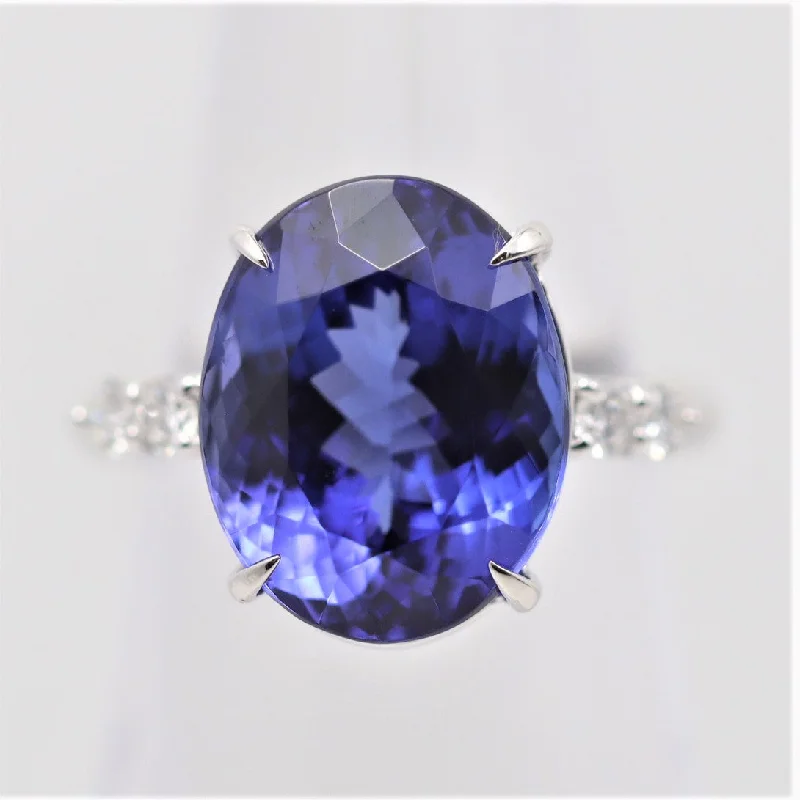 Glossy band rings-11.25 Carat Tanzanite Diamond Platinum Ring